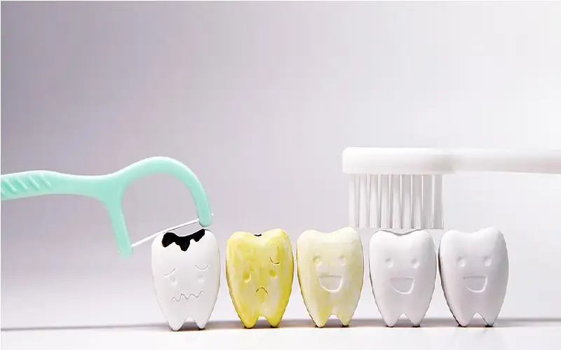 ما علاقة تغير لون الأسنان بمشاكل