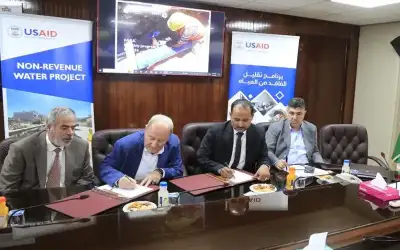 المياه توقع اتفاقيتين مع الوكالة الأميركية