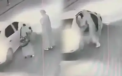 شاهد.. يتنكر في زي نسائي لخطف