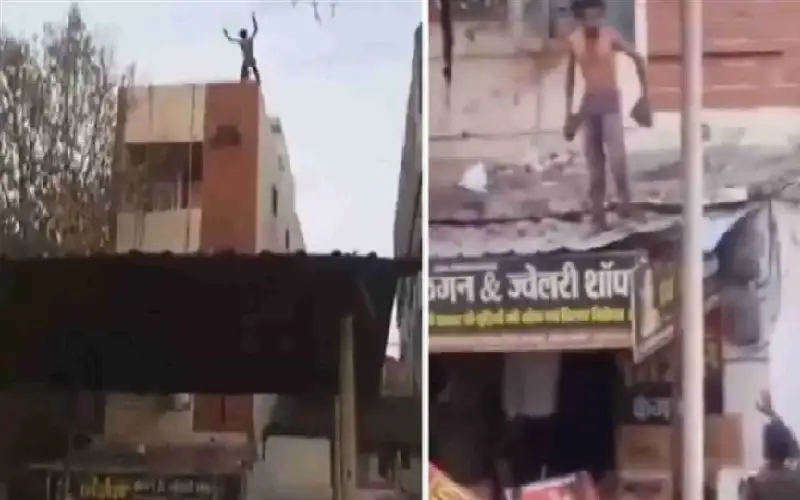 رجل يقفز من مبنى ويصعق بالكهرباء