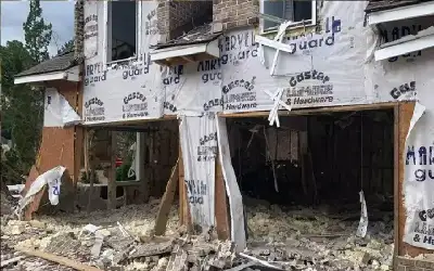 السجن 20 عاما لأمريكي فجر منزل