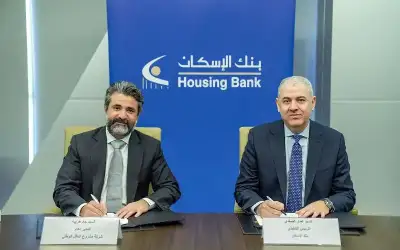 بنك الإسكان يوقع وثيقة الشروط والأحكام