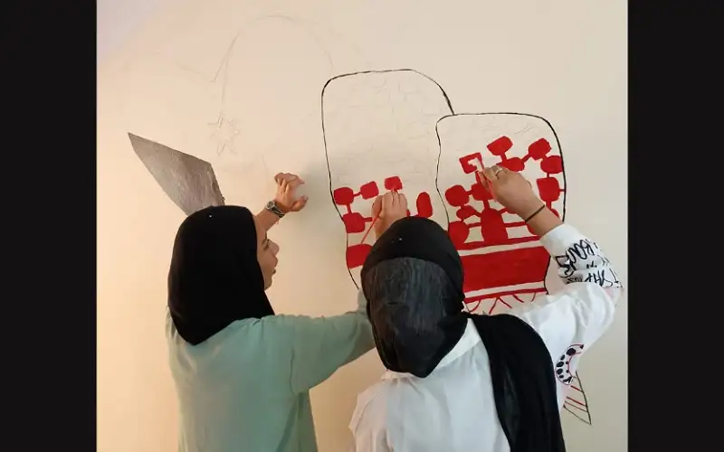 مركز شابات غور الصافي ينظم نشاطًا فنيا مبادرات تطوعية لرسم الجداريات