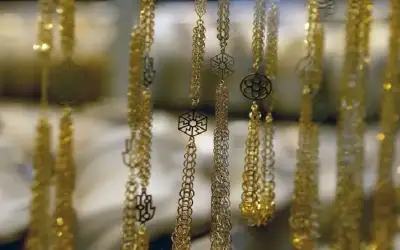 60.5 دينارا سعر الذهب عيار 21