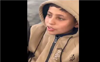 هذا الطفل ابن الشهيد مجدي التتر