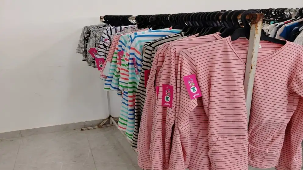 بنك الملابس يوزع كسوة على 200