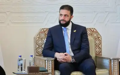 الشرع يرتدي اكسسوارا يمثل عقاب سوريا
