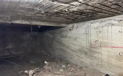 إجراء كشف ميداني لبناية سكنية في