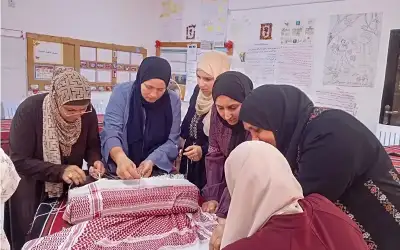ورشة تهذيب الشماغ في مركز شباب