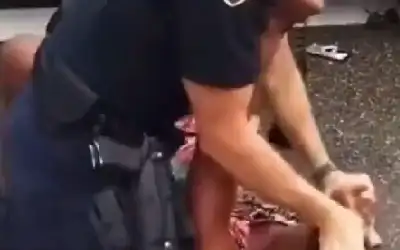 ضابط يعتدي بوحشية على سيدة من