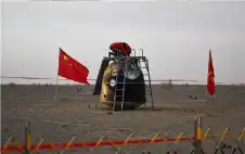 كبسولة العودة الصينية المتضررة تهبط بلا