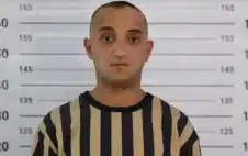 القبض على سجان سابق بصيدنايا ..