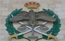 إحالة 9 عمداء و16 عقيدا في