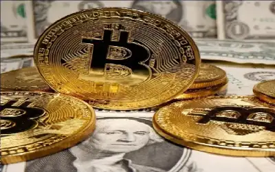 بتكوين تتراجع دون 77 ألف دولار