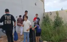 شباب الوسطية يشاركون في حملة نظافة
