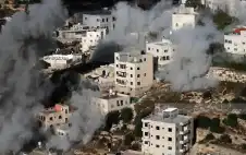 الخليل: الاحتلال يفجر منزلي شهيدين في