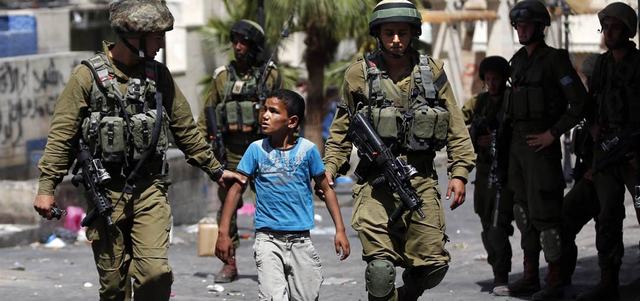 450 طفلا فلسطينيا معتقلا في سجون