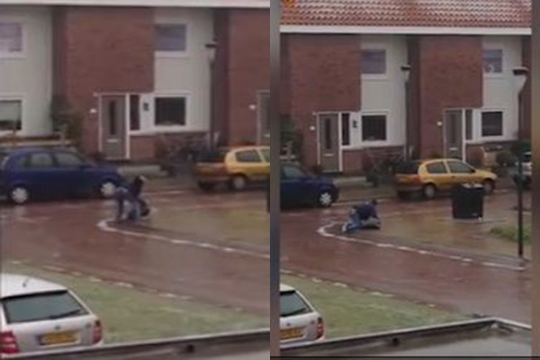 رجل يزحف على الأرض ليصل إلى