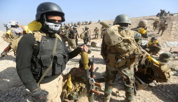 العراق: (الحشد) تسحب أسلحة حاجز أمني