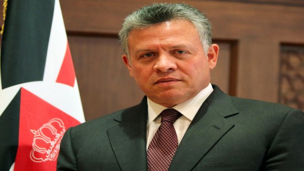 الملك يبحث هاتفيا مع العبادي جهود