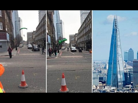 بالفيديو.. مظلي يقفز من ناطحة سحاب