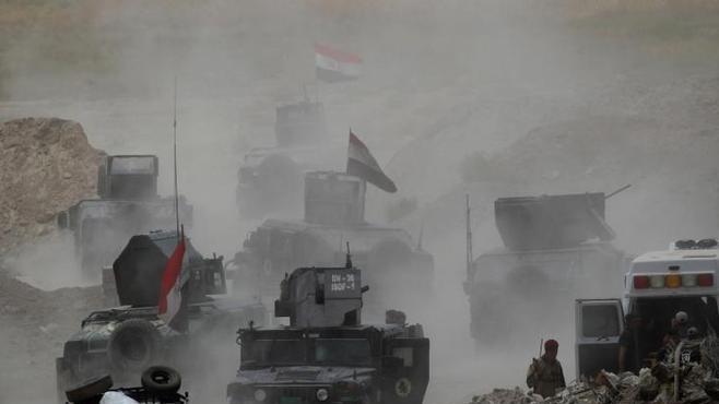الجيش العراقي يؤمن أول مسار خروج